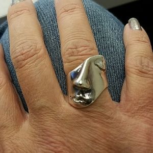 Sterling silver ring with a face